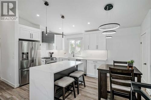 1315 105 Avenue Sw, Calgary, AB - Indoor Photo Showing Kitchen With Upgraded Kitchen