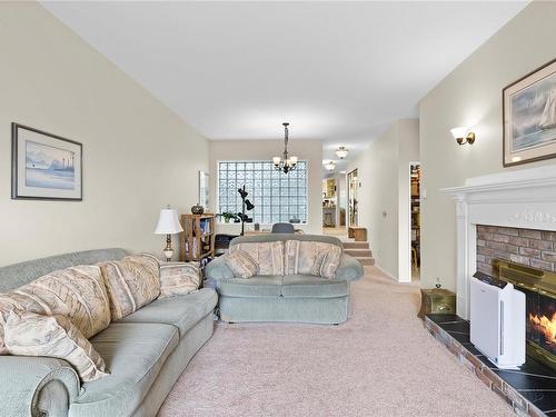 210-2250 Manor Pl, Comox, BC - Indoor Photo Showing Living Room With Fireplace