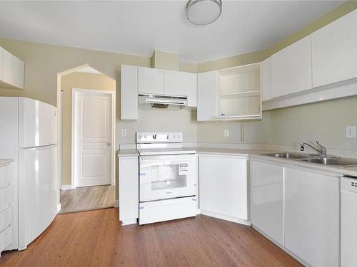 401-935 Johnson St, Victoria, BC - Indoor Photo Showing Kitchen With Double Sink