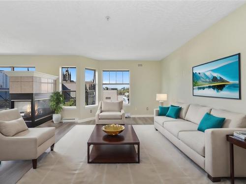 401-935 Johnson St, Victoria, BC - Indoor Photo Showing Living Room With Fireplace