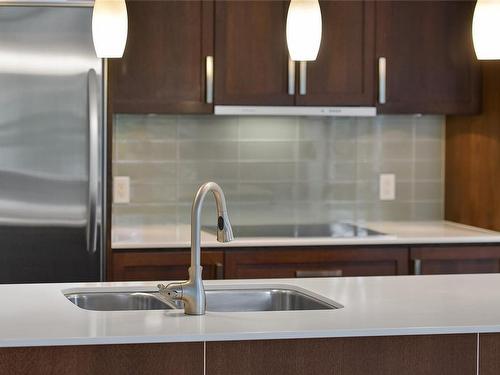 306-999 Burdett Ave, Victoria, BC - Indoor Photo Showing Kitchen With Double Sink