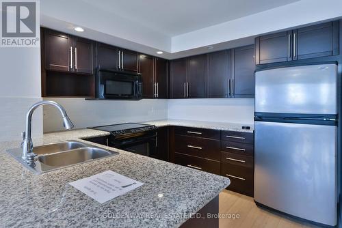 572 - 23 Cox Boulevard, Markham, ON - Indoor Photo Showing Kitchen With Double Sink With Upgraded Kitchen