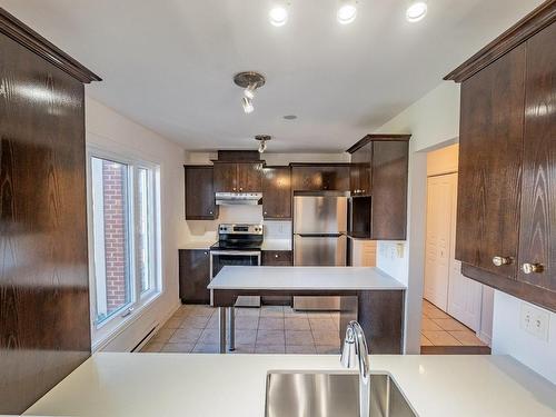 Cuisine - 4-4655 Ch. Des Prairies, Brossard, QC - Indoor Photo Showing Kitchen With Double Sink