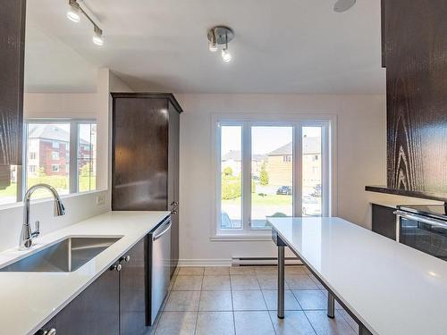 Cuisine - 4-4655 Ch. Des Prairies, Brossard, QC - Indoor Photo Showing Kitchen