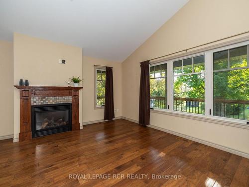 30 Victoria St W, Southgate, ON - Indoor Photo Showing Living Room With Fireplace