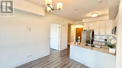 334 - 128 Grovewood Common, Oakville, ON - Indoor Photo Showing Kitchen