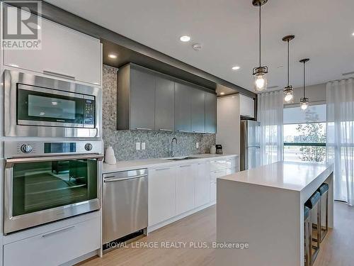 334 - 128 Grovewood Common, Oakville, ON - Indoor Photo Showing Kitchen With Stainless Steel Kitchen With Upgraded Kitchen