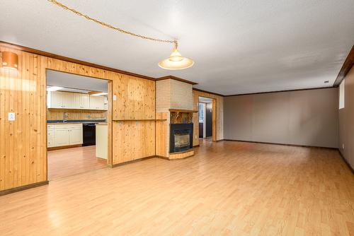 11901 Kalamalka Road, Coldstream, BC - Indoor Photo Showing Other Room With Fireplace