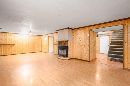 11901 Kalamalka Road, Coldstream, BC - Indoor Photo Showing Other Room With Fireplace