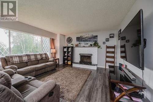 4247 Highland Drive, Prince George, BC - Indoor Photo Showing Living Room With Fireplace