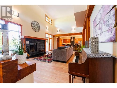 2442 Perrier  Lane, Nelson, BC - Indoor Photo Showing Living Room With Fireplace