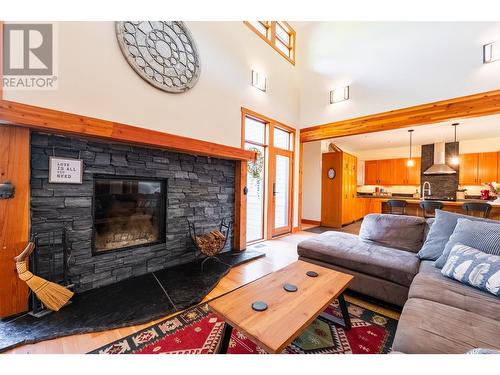 2442 Perrier  Lane, Nelson, BC - Indoor Photo Showing Living Room With Fireplace