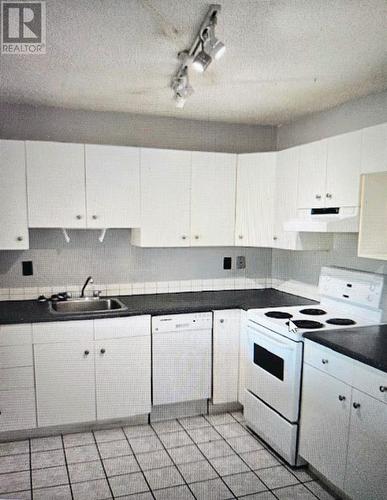 kitchen - 304, 809 4 Street Ne, Calgary, AB - Indoor Photo Showing Kitchen