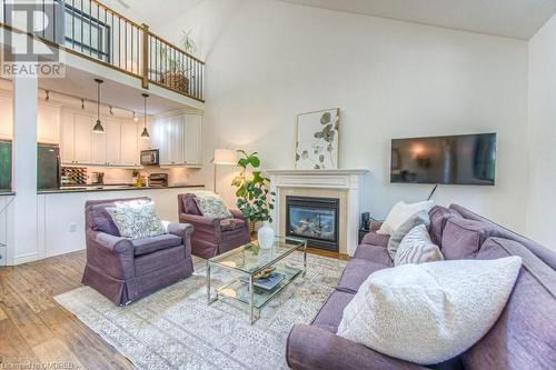 2141 Caroline Street Unit# 14, Burlington, ON - Indoor Photo Showing Living Room With Fireplace