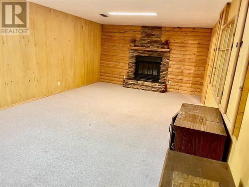 118 Brantford Crescent Nw, Calgary, AB - Indoor Photo Showing Living Room With Fireplace