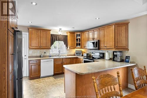 6 Katie, Kingsville, ON - Indoor Photo Showing Kitchen With Double Sink