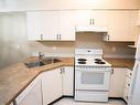 102-3215 Cowichan Lake Rd, Duncan, BC  - Indoor Photo Showing Kitchen With Double Sink 