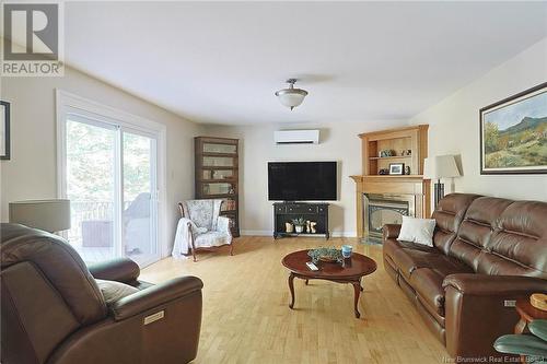 181 Woodlawn Lane, New Maryland, NB - Indoor Photo Showing Living Room With Fireplace