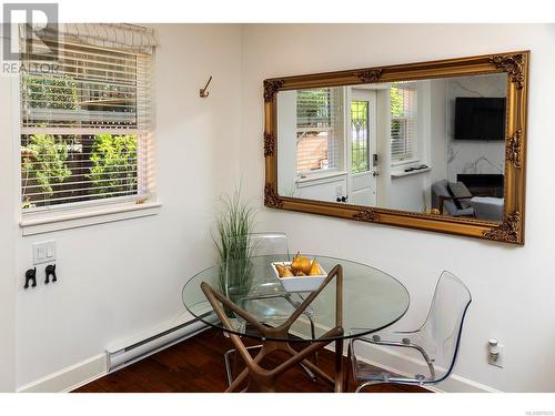 Dining space with walnut floors. - 2 1146 Richardson St, Victoria, BC - Indoor Photo Showing Other Room