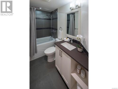 Main four-piece bathroom with heated floors. - 2 1146 Richardson St, Victoria, BC - Indoor Photo Showing Bathroom