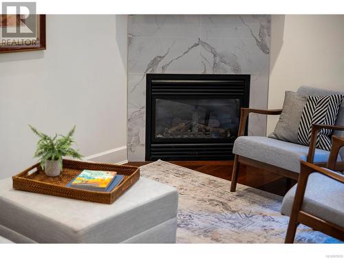 Gas fireplace detail. - 2 1146 Richardson St, Victoria, BC - Indoor Photo Showing Living Room With Fireplace