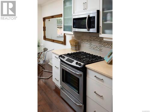 Kitchen detail including gas range. - 2 1146 Richardson St, Victoria, BC - Indoor Photo Showing Kitchen