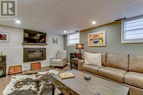 95 Lawrence Avenue, St. Thomas, ON - Indoor Photo Showing Basement With Fireplace