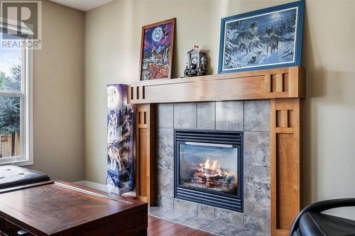 24 Copperstone Place Se, Calgary, AB - Indoor With Fireplace