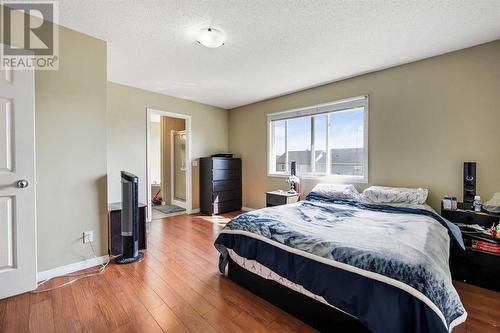 24 Copperstone Place Se, Calgary, AB - Indoor Photo Showing Bedroom