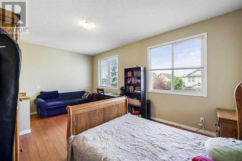 24 Copperstone Place Se, Calgary, AB - Indoor Photo Showing Bedroom