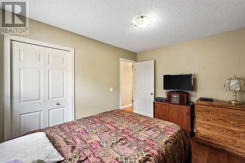 24 Copperstone Place Se, Calgary, AB - Indoor Photo Showing Bedroom