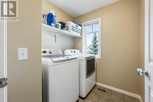 24 Copperstone Place Se, Calgary, AB - Indoor Photo Showing Laundry Room