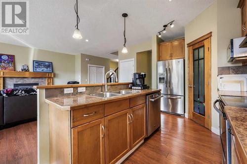 24 Copperstone Place Se, Calgary, AB - Indoor Photo Showing Kitchen With Double Sink