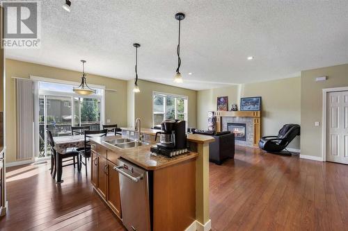 24 Copperstone Place Se, Calgary, AB - Indoor Photo Showing Other Room With Fireplace