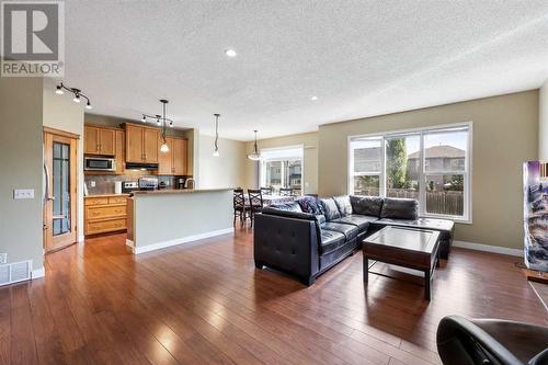 24 Copperstone Place Se, Calgary, AB - Indoor Photo Showing Living Room