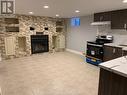 1120 Parkview Avenue Unit# Lower, Windsor, ON  - Indoor With Fireplace 