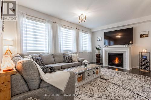 228 Edgar Bonner Avenue, Guelph/Eramosa, ON - Indoor Photo Showing Living Room With Fireplace