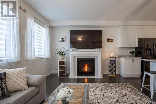 228 Edgar Bonner Avenue, Guelph/Eramosa, ON - Indoor Photo Showing Living Room With Fireplace