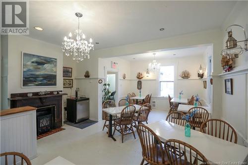 4 Snows Lane, St. Martins, NB - Indoor Photo Showing Dining Room With Fireplace