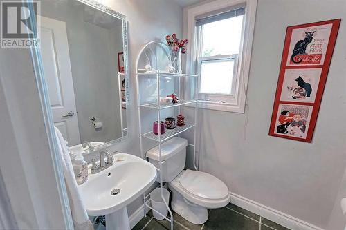 2-piece main floor powder room - 2417 53 Avenue Sw, Calgary, AB - Indoor Photo Showing Bathroom