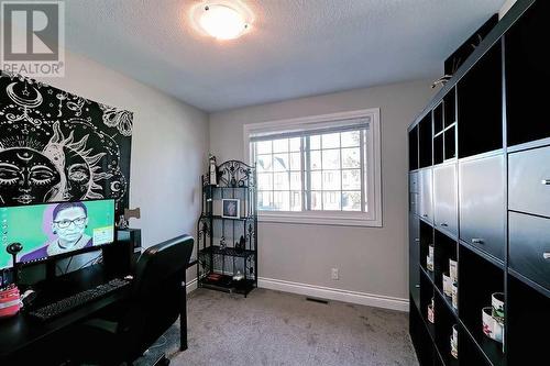 Upper bedroom 3. Office, yoga room, craft space... you get to choose! - 2417 53 Avenue Sw, Calgary, AB - Indoor