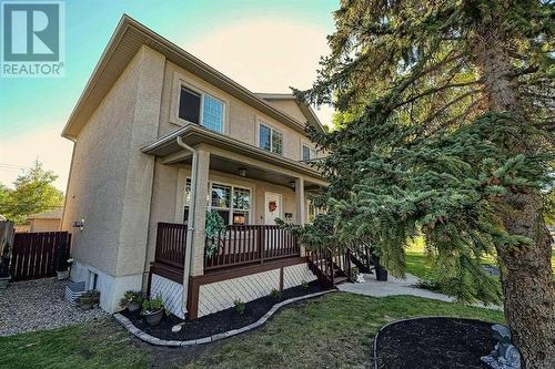 Love the smell of a gentle rain? Sit out on your covered veranda and enjoy! - 2417 53 Avenue Sw, Calgary, AB - Outdoor With Deck Patio Veranda