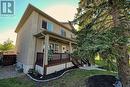 Love the smell of a gentle rain? Sit out on your covered veranda and enjoy! - 2417 53 Avenue Sw, Calgary, AB  - Outdoor With Deck Patio Veranda 