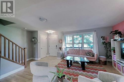 Bright and airy with those large windows - 2417 53 Avenue Sw, Calgary, AB - Indoor Photo Showing Living Room