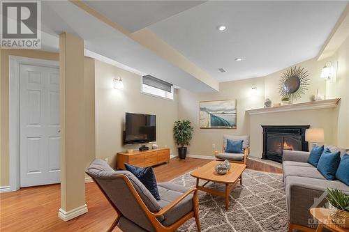 virtually staged - 808 Nesting Way, Ottawa, ON - Indoor Photo Showing Living Room With Fireplace