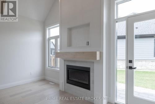 35 - 63 Compass Trail, Central Elgin (Port Stanley), ON - Indoor Photo Showing Living Room With Fireplace