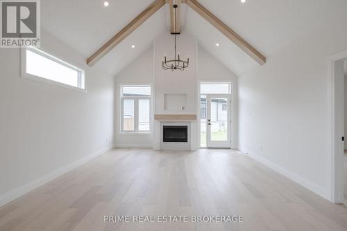 35 - 63 Compass Trail, Central Elgin (Port Stanley), ON - Indoor Photo Showing Living Room With Fireplace