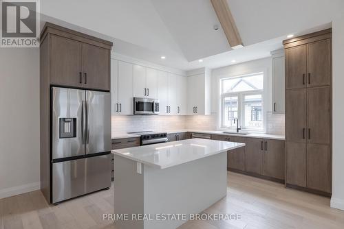 35 - 63 Compass Trail, Central Elgin (Port Stanley), ON - Indoor Photo Showing Kitchen With Upgraded Kitchen