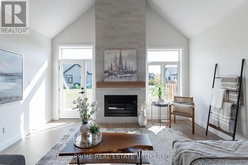 47 - 63 Compass Trail, Central Elgin (Port Stanley), ON - Indoor Photo Showing Living Room With Fireplace