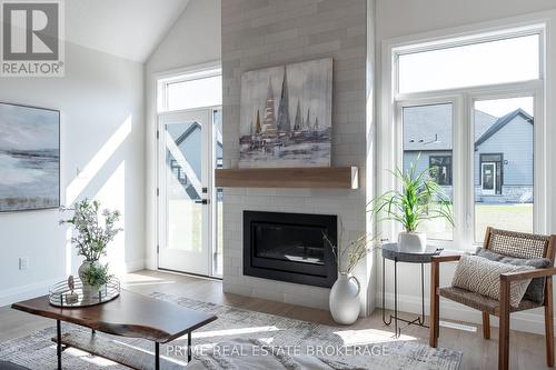 47 - 63 Compass Trail, Central Elgin (Port Stanley), ON - Indoor Photo Showing Living Room With Fireplace